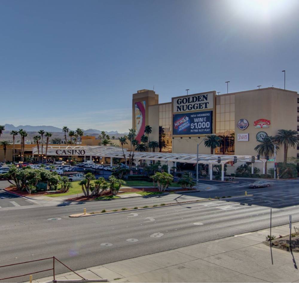 A view of the parking lot and the building.